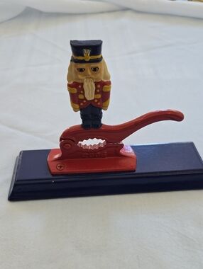 Vintage Houston Harvest Cast Iron Soldier Nutcracker Wood Base 2006